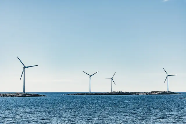 Wind turbines on low islands in a calm sea